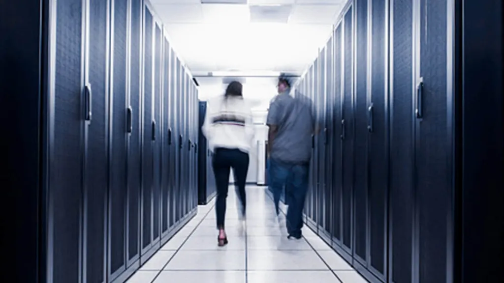Enterprise data center aisle lined with server racks