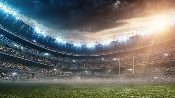 Packed stadium at night running on RUCKUS venue Wi-Fi